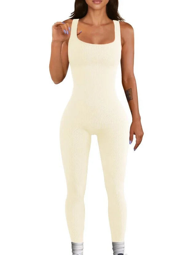 Woman wearing elegant beige women’s jumpsuit, perfect for casual or activewear style.