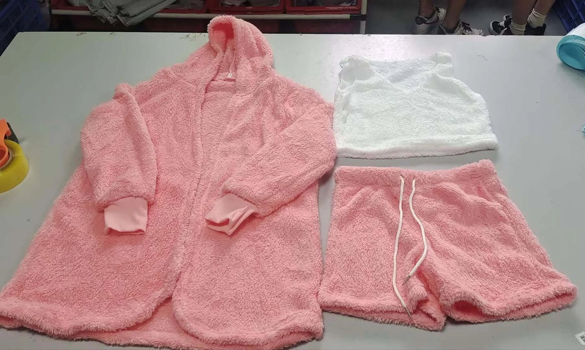 Comfortable women's 3 piece lounge pajama set with a pink cardigan, matching shorts, and white top for cozy sleepwear.