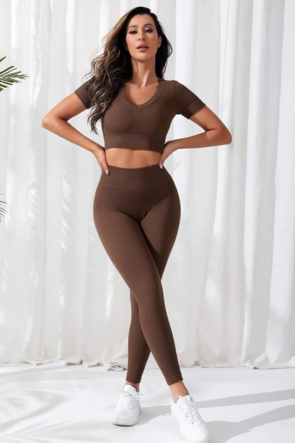 Women’s Seamless V-Neck Crop Top & High-Waist Leggings Set in solid brown, perfect for yoga, featuring a sporty, slim fit design.
